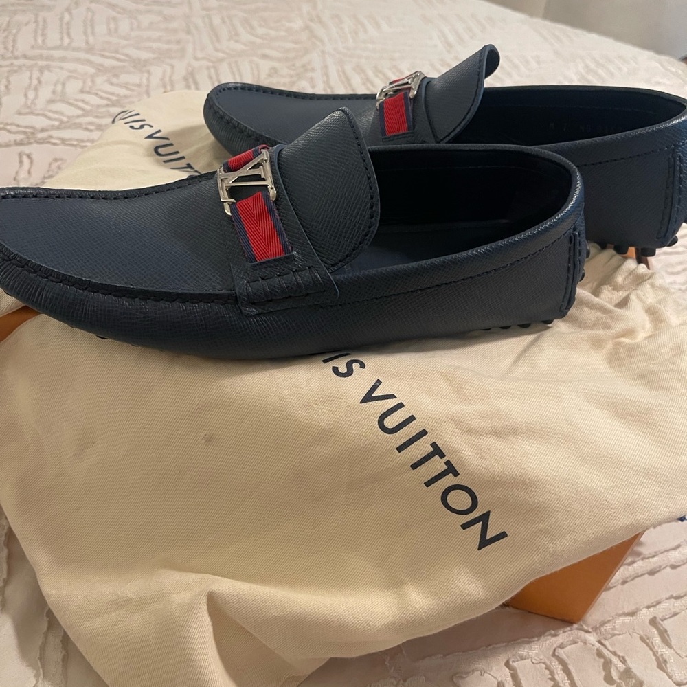 Louis Vuitton Men's Black Loafers
A little scuff on the lower front of the shoes